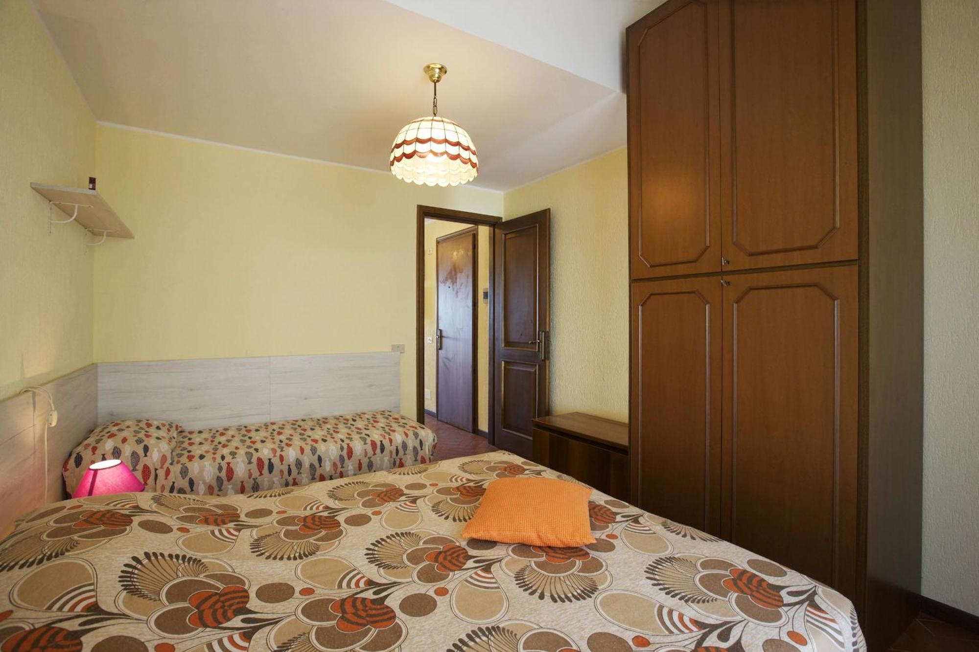Residenz La Vela Apartment Бавено Стая снимка